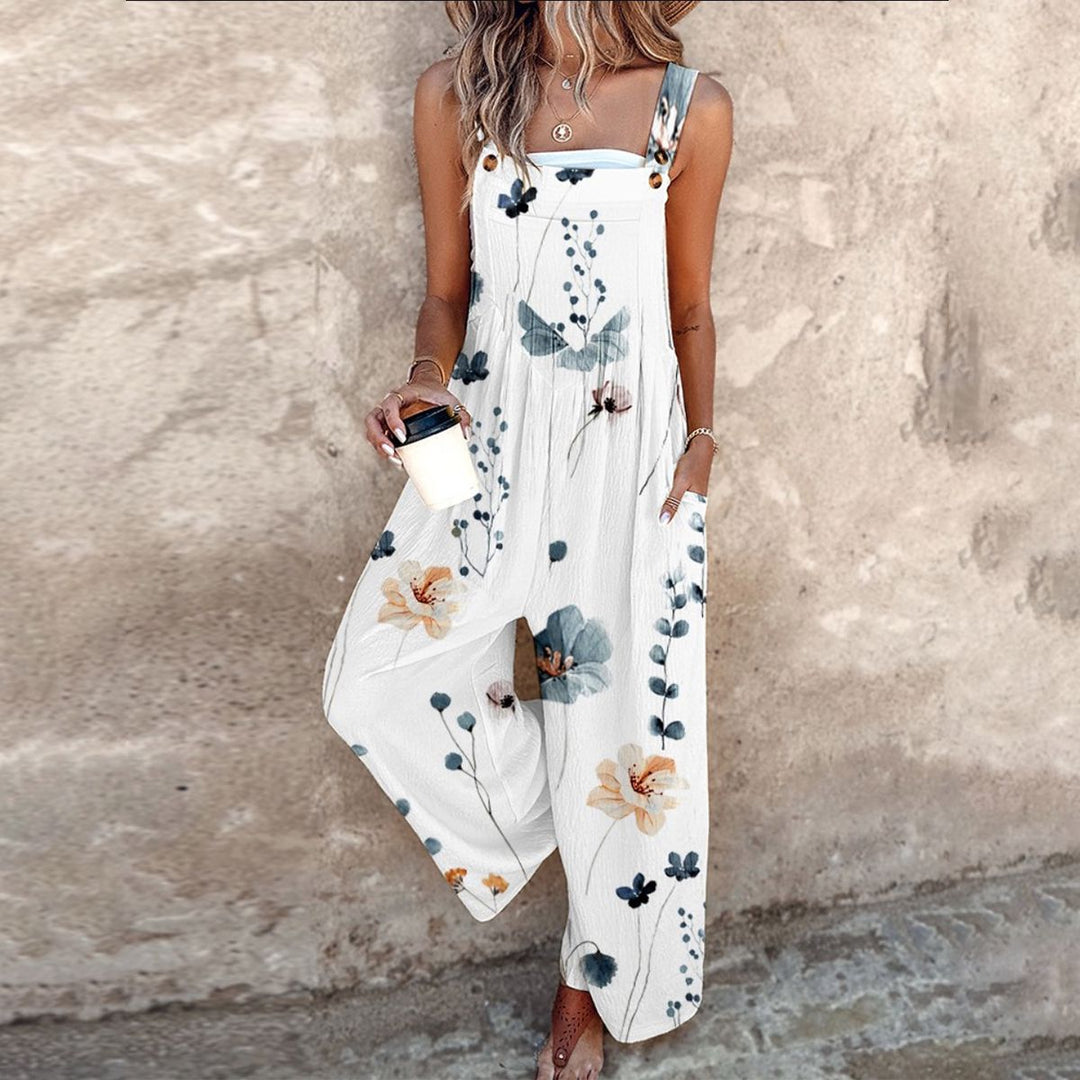 Dames zomer jumpsuit met levendige bloemenprint en wijde, comfortabele pasvorm, perfect voor een zonnige dag.