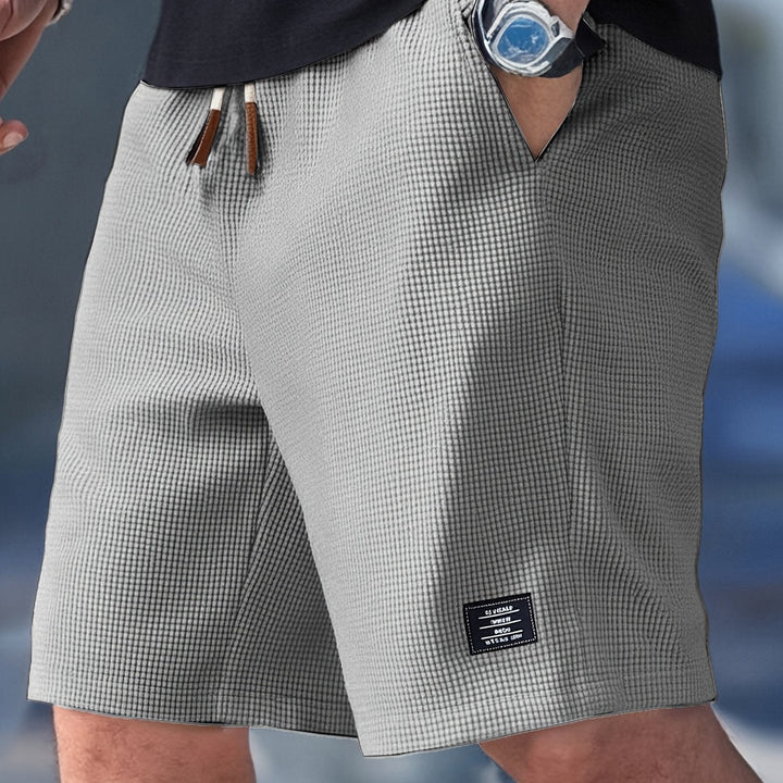 Ademende en comfortabele heren short, ideaal voor hete zomerdagen, biedt optimale bewegingsvrijheid.
