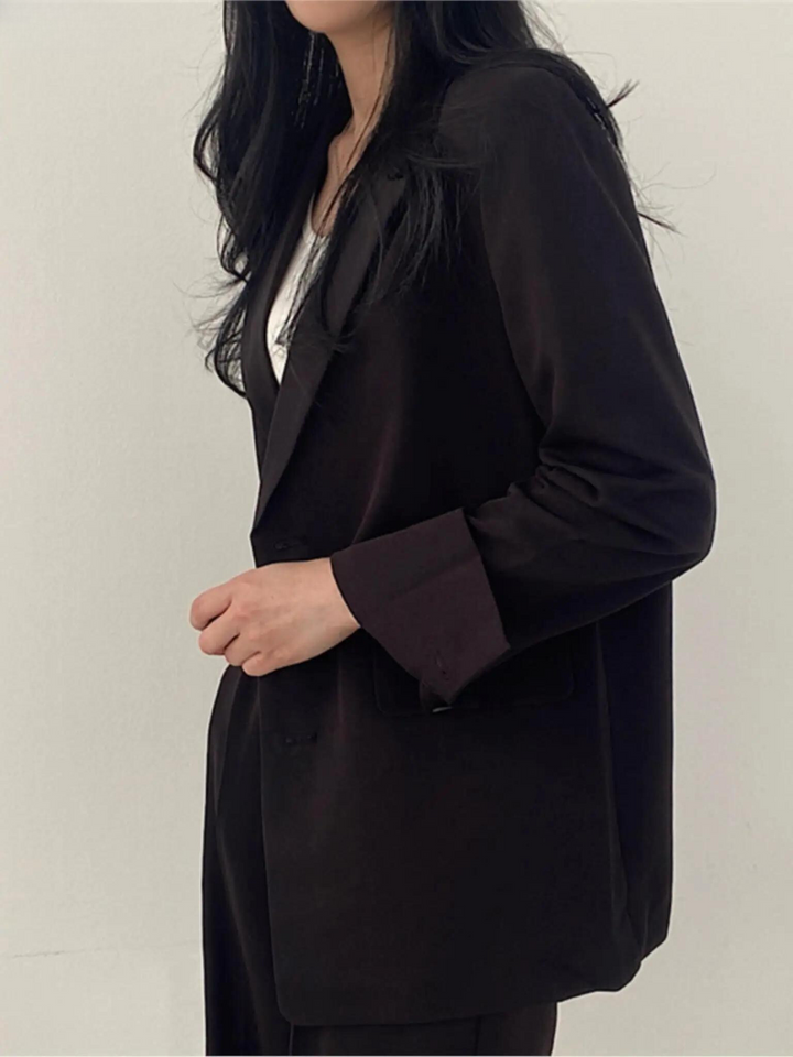 Vrouwen pantalonpak: Zakelijk & elegant tweedelig dames pak, perfect voor de kantoorlook.