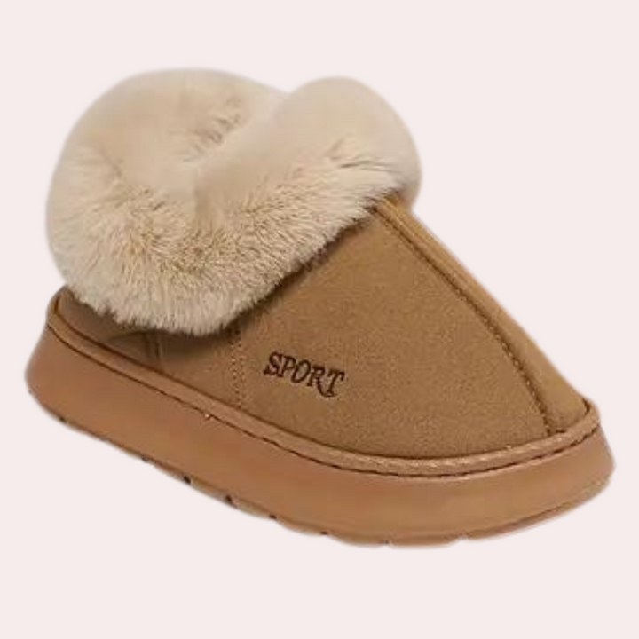 Geniet van het comfort van deze zachte dames pantoffels. Warme huisschoenen voor ontspanning.