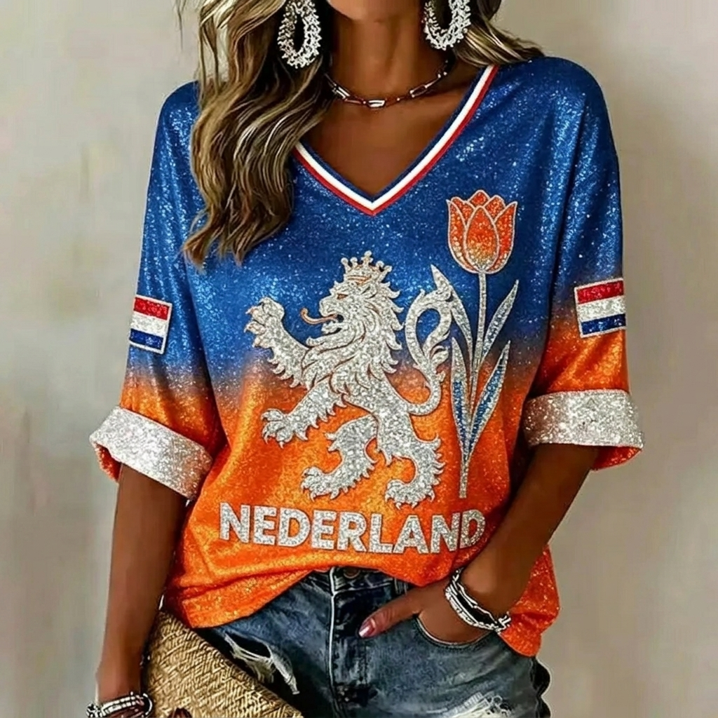 Dames getailleerde oranje WK-top met print, ideaal voor zomerse dagen, feesten of casual WK 2026 kleding.