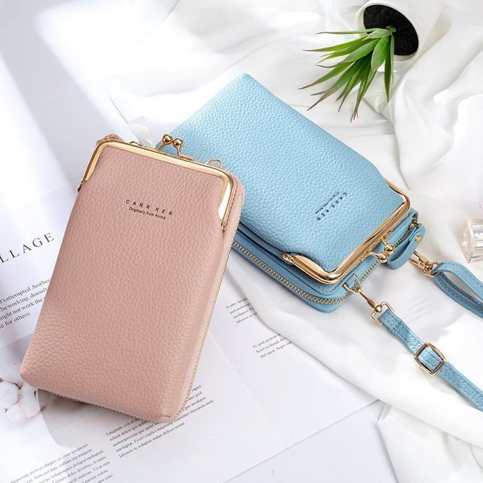 Dames schoudertas: compact telefoontasje van PU leer, stijlvol en praktisch met organizerfunctie.