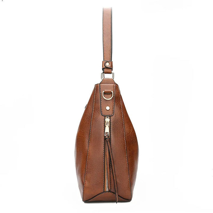 Blauwe stijlvolle crossbody tas voor dames; functioneel, elegant en trendy accessoire.