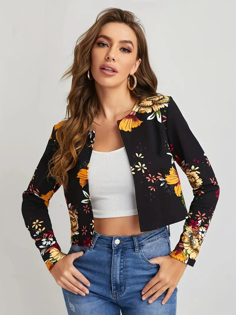 Dames zwarte elegante blazer met open voorkant en kleurrijke bloemenprint, ideaal voor een stijlvolle lente outfit.