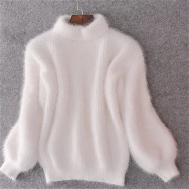 Modieuze gebreide damestrui Livia met ronde hals en lange mouwen, elegant voor winterse dagen.