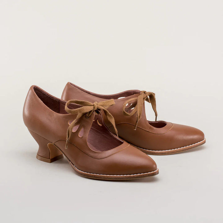 Gezonde orthopedische damesschoenen met comfortabele hak, elegant voor zomerse dagen, goede voetondersteuning.