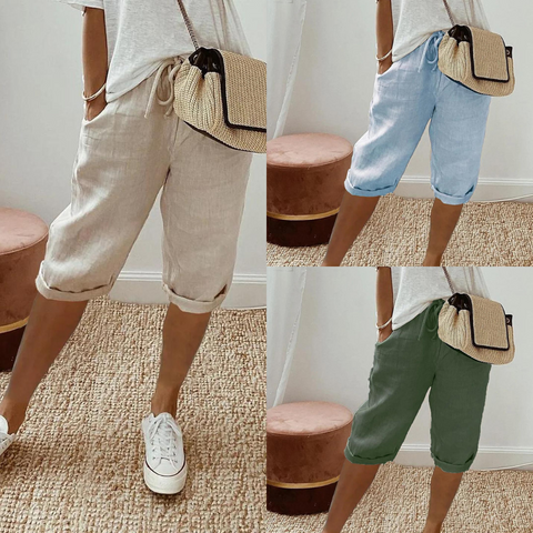 Dames comfort capribroek CJ26 met praktische zakken en elastische taille, ideaal voor zomerse vrijetijd.
