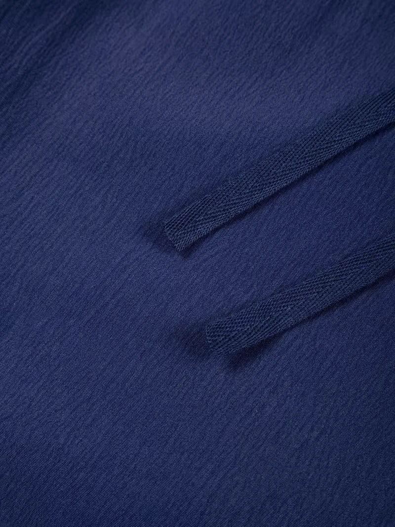 Zwarte heren plissé shorts, met trekkoord en elastische tailleband, voor stijlvol comfort.