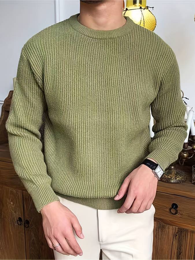 Platte lay-out van een gebreide heren trui, warm en stijlvol, deel van de nieuwe wintercollectie.