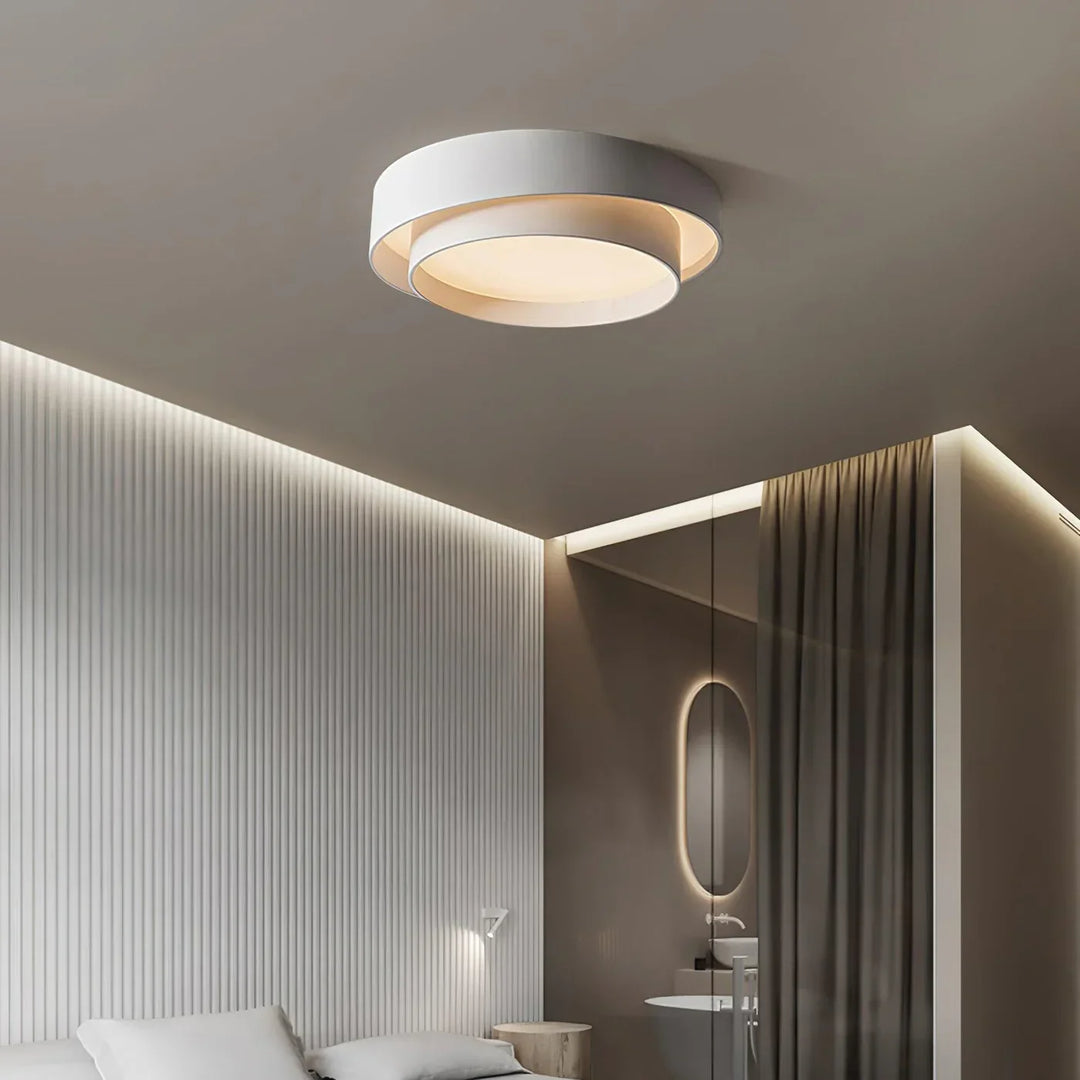 Dimbare LED plafondlamp, rond model, perfect voor een moderne slaapkamer.