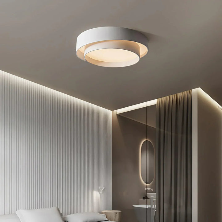 Dimbare LED plafondlamp, rond model, perfect voor een moderne slaapkamer.