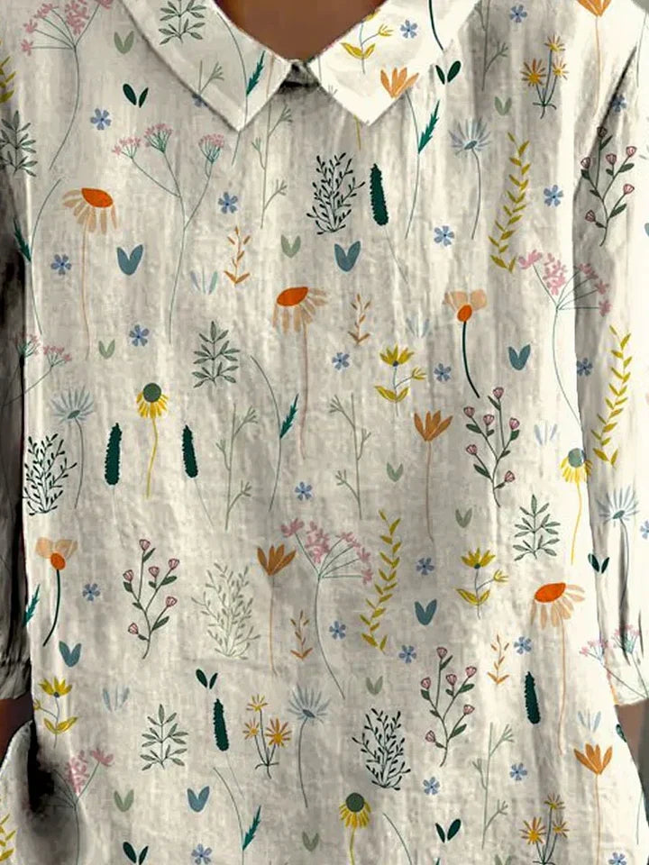 Comfortabele en chique damesblouse met elegante wildflower bloemenprint. Perfect voor casual én geklede looks.