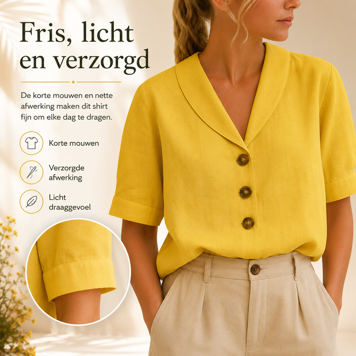 Gedetailleerde close-up van de envelophals en knoopdetails op een trendy, comfortabel dames t-shirt.