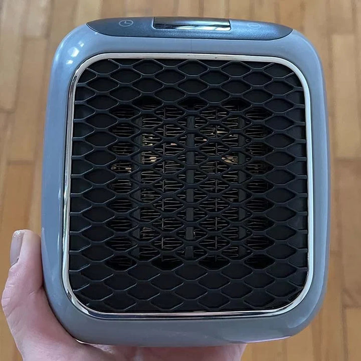 Gedetailleerd beeld van de compacte Hulvio draagbare verwarming, energiezuinig en veilig voor wintercomfort.