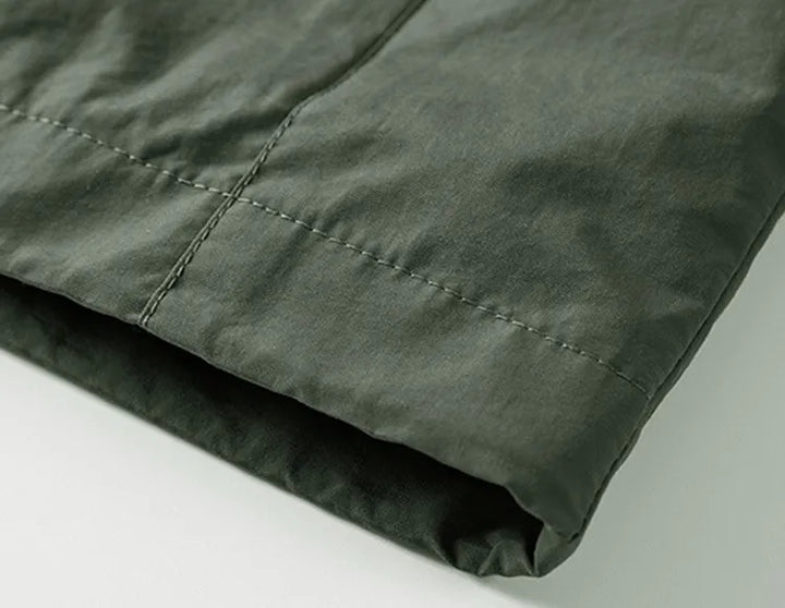 All-weather waterdichte herenjas met afneembare capuchon, perfect voor outdoor avontuur. Functionele bovenkleding.