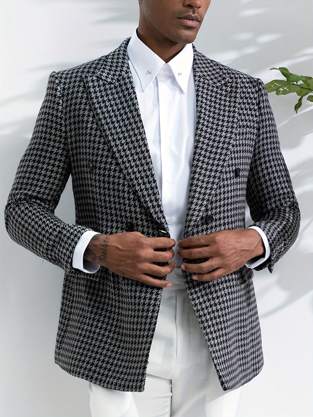 Zwart-wit geruite stof van de Oliver heren blazer, klassiek ruitpatroon met moderne uitstraling, hoogwaardig jasje.