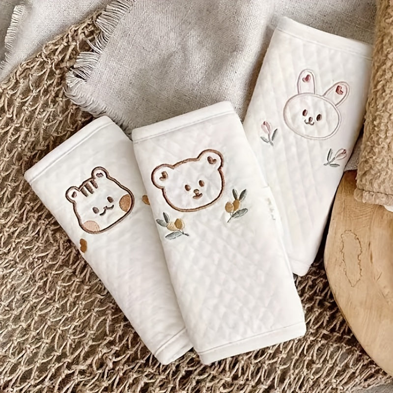 Zachte kinder schouderpads met dierenmotief voor optimaal comfort in kinderwagen en autostoel.