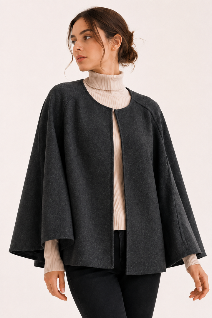Elegante dames cape-mantel, losvallend model met open voorkant en wijde mouwen. Perfecte stijlvolle bovenkleding voor dames.