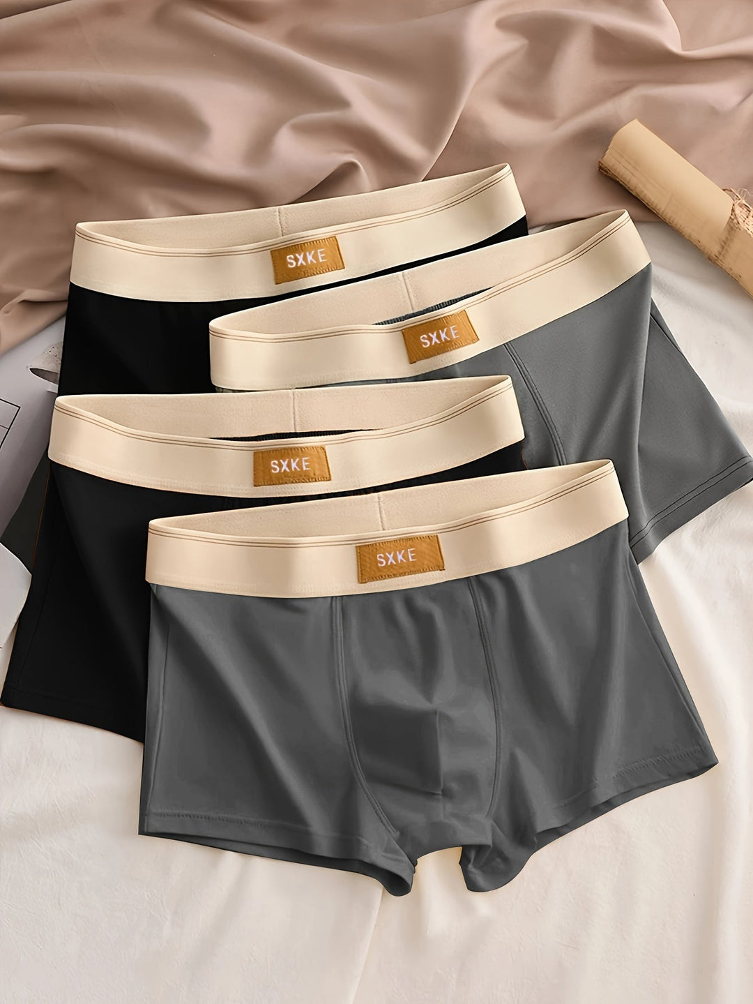 Betaalbare 4-pack effen heren boxershorts van stretchstof. Duurzaam ondergoed voor dagelijks comfort en een slanke pasvorm.