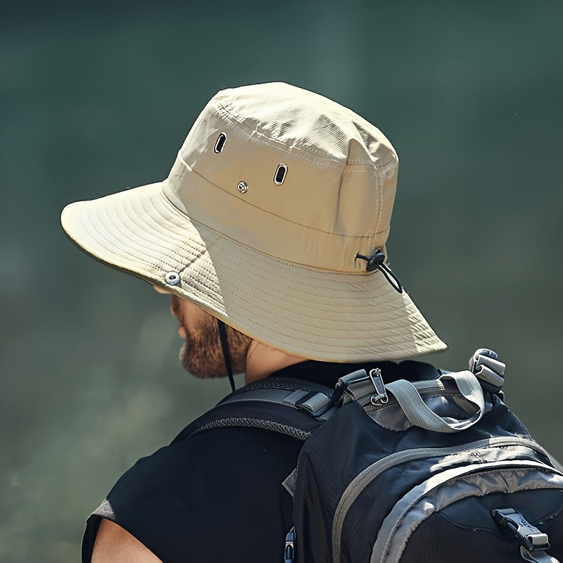 "Ademende zomerhoed met brede rand, verstelbare pasvorm en ventilatieopeningen, ideaal voor zonnige outdoor avonturen."