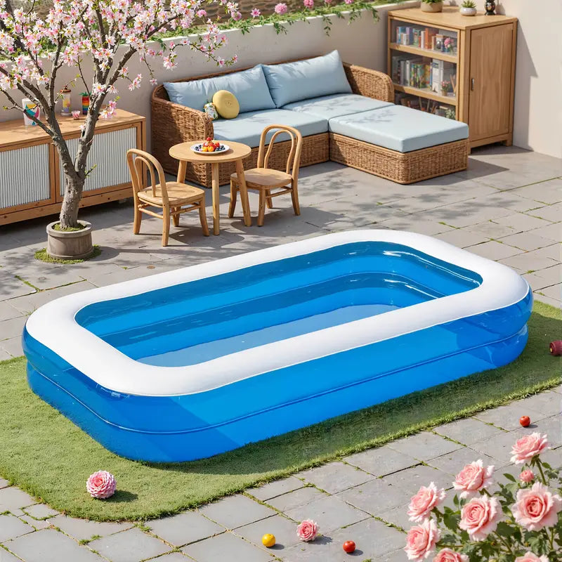 Vierpersoons opblaasbaar zwembad in een groene tuin, ideaal voor zomerse ontspanning en verfrissing.