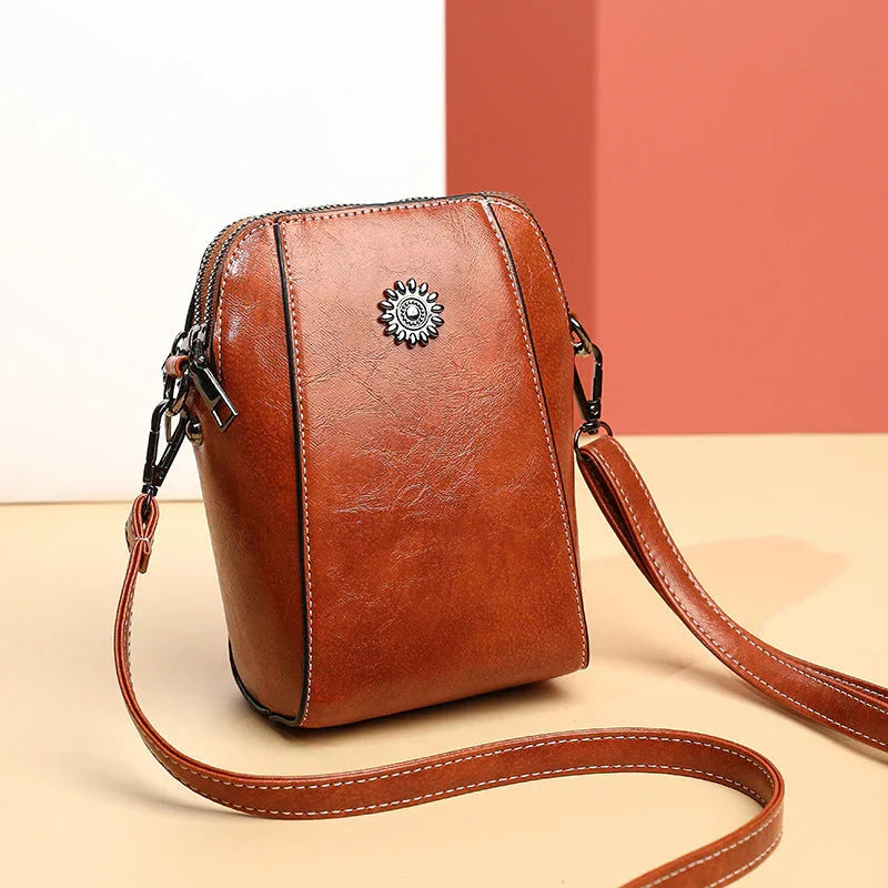 Elegante Charina dames schoudertas van hoogwaardig kunstleer, verkrijgbaar in bruin, zwart, rood en groen. Modieus accessoire.