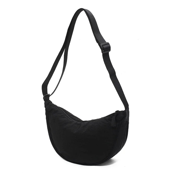 Elegante dames dumpling handtas, een modieus accessoire dat past bij elke outfit.
