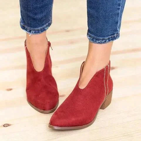 Elegante dames enkellaarzen met stevige blokhak en praktische zijrits, ideaal voor een modieuze dagelijkse look.