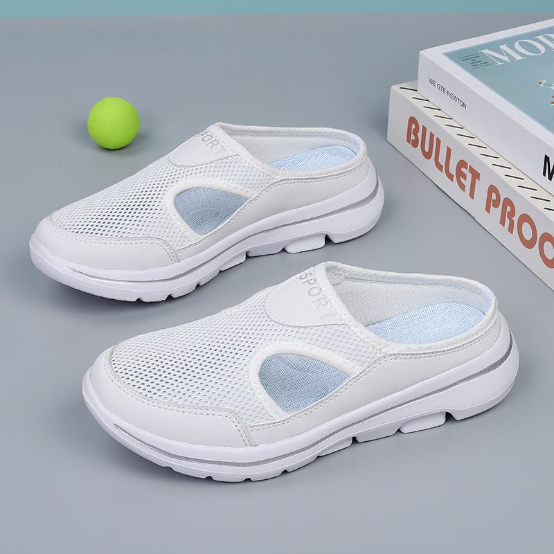 Vooraanzicht van grijze unisex instappers. Ademende en comfortabele slip-ons, ideaal als lichte wandelschoenen.