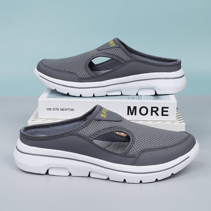 Grijze unisex loafers met ademend bovenwerk en comfortabele zool. Lichtgewicht slip-on zomerschoenen voor hem en haar.