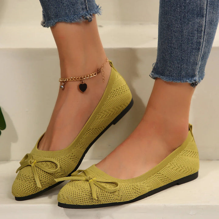 Elegante dames ballerina's met puntige neus en chic strikdetail; ideaal voor casual en chic.