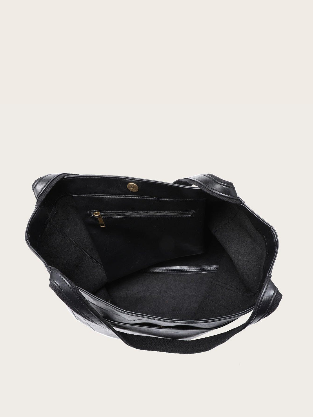 Moderne zwarte veganistische leren handtas, duurzaam en praktisch, perfect voor dagelijks gebruik en avondjes uit.