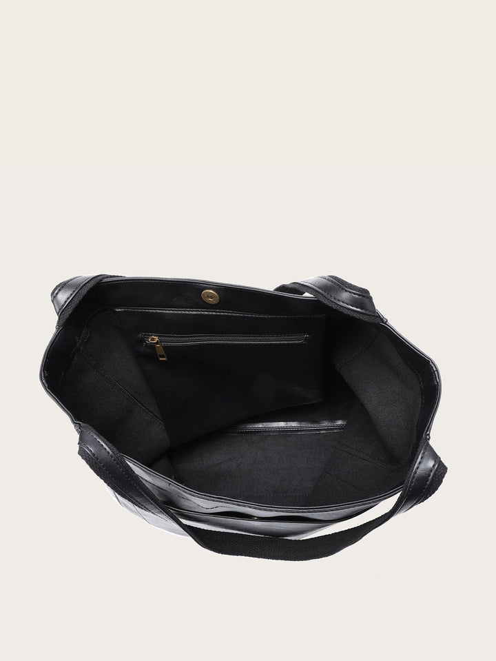 Moderne zwarte veganistische leren handtas, duurzaam en praktisch, perfect voor dagelijks gebruik en avondjes uit.