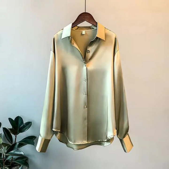 Chique damesblouse met charmante retro look. Comfortabele, stijlvolle top voor dames, ideaal voor modebewuste vrouwen.