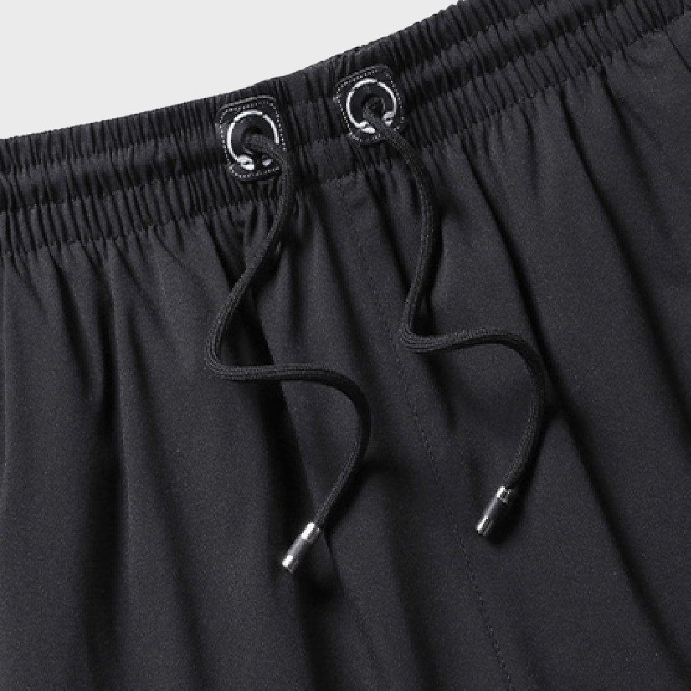 Heren strand korte broek met trekkoord, comfortabel en sneldrogend. Ideaal voor een relaxte dag aan zee.