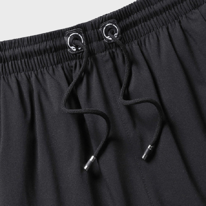 Heren strand korte broek met trekkoord, comfortabel en sneldrogend. Ideaal voor een relaxte dag aan zee.