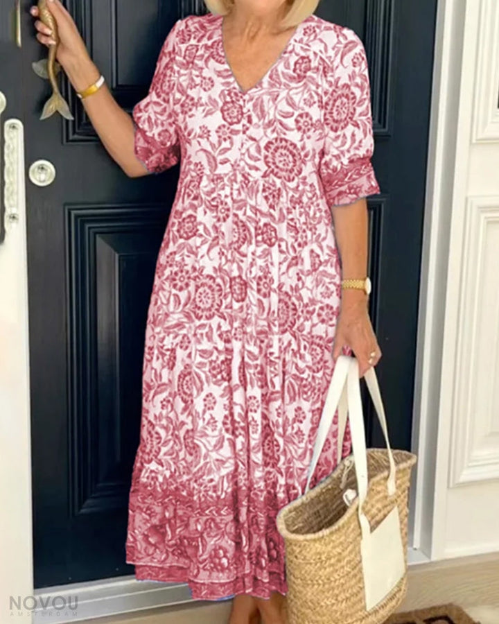 Modieuze A-lijn bloemenjurk voor dames met elegante V-hals. Comfortabele en stijlvolle zomerjurk.
