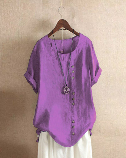 "Asymmetrische linnen blouse met moderne knopen, lichtgroen, ideaal voor casual en chique gelegenheden, stijlvolle look."