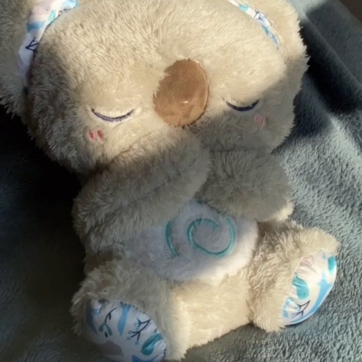 Close-up van zachte, ademende pluche koala, uitnodigend voor knuffels en een ontspannen slaap.