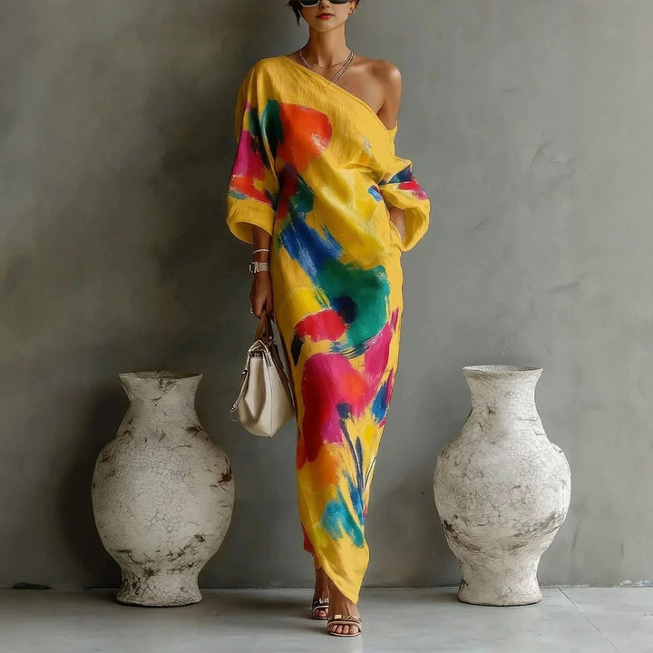 Modieuze dames casual off-shoulder jurk, CJ26. Levendige graffiti print, relaxte pasvorm, perfect voor zomerse dagen.