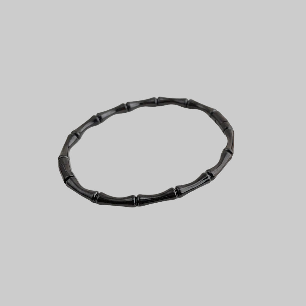 Stijlvolle dames bamboeschakel armband van duurzaam titanium staal. Verkrijgbaar in goud, zilver, roségoud, zwart.