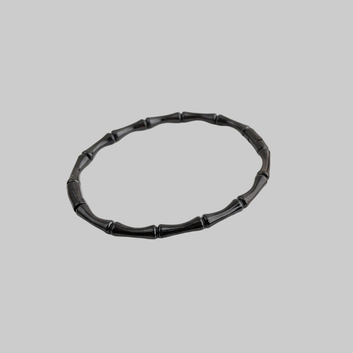 Stijlvolle dames bamboeschakel armband van duurzaam titanium staal. Verkrijgbaar in goud, zilver, roségoud, zwart.