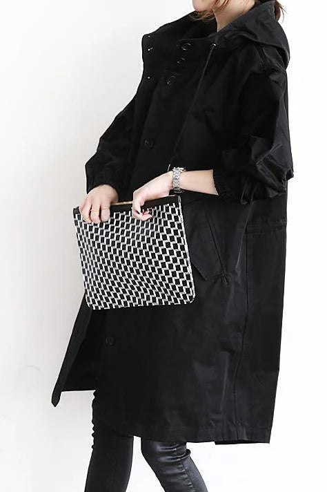 Dunne waterafstotende trenchcoat voor dames, een modieuze en praktische herfstjas.