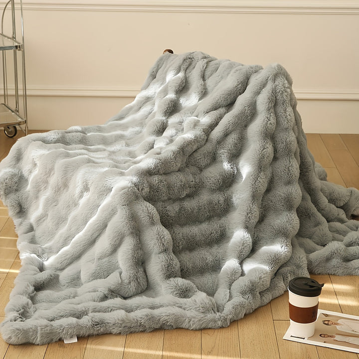 Warme kantoordeken van zacht fleece, ideaal voor extra comfort en warmte op het werk.