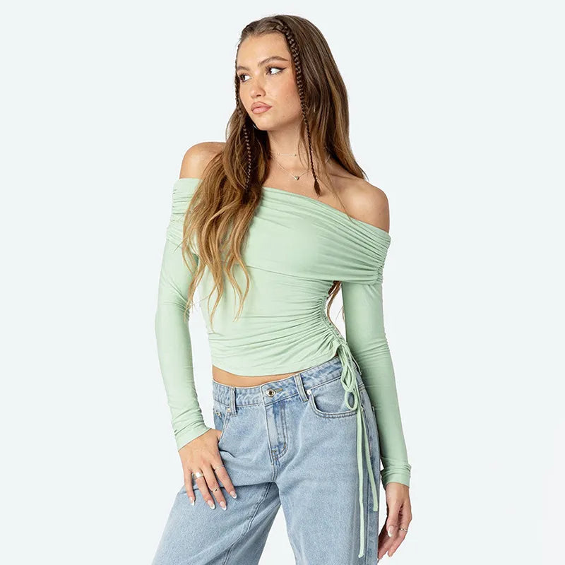 Elegante groene dames off-shoulder top met lange mouwen, perfect voor stijlvolle avonden of een casual chique look.