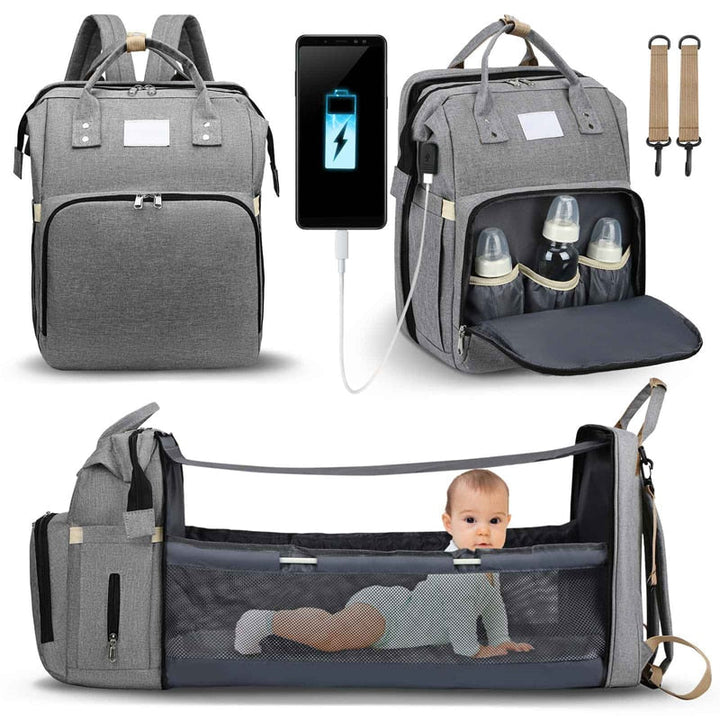 Stijlvolle multifunctionele verzorgingstas voor ouders; inclusief opvouwbaar babybed voor de baby.