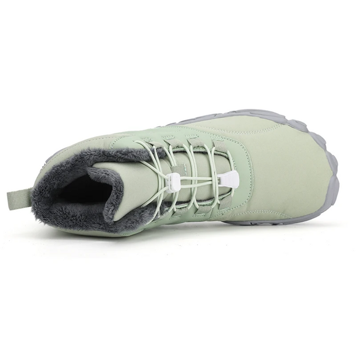 Orthopedisch verantwoorde FrostFlex barefoot winterlaarzen, met flexibele zool voor optimaal comfort.
