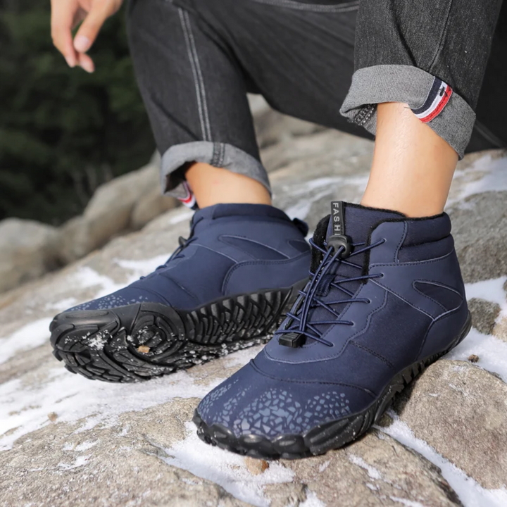 Duurzame FrostFlex barefoot winterlaarzen voor heren, bieden optimale warmte en flexibiliteit.