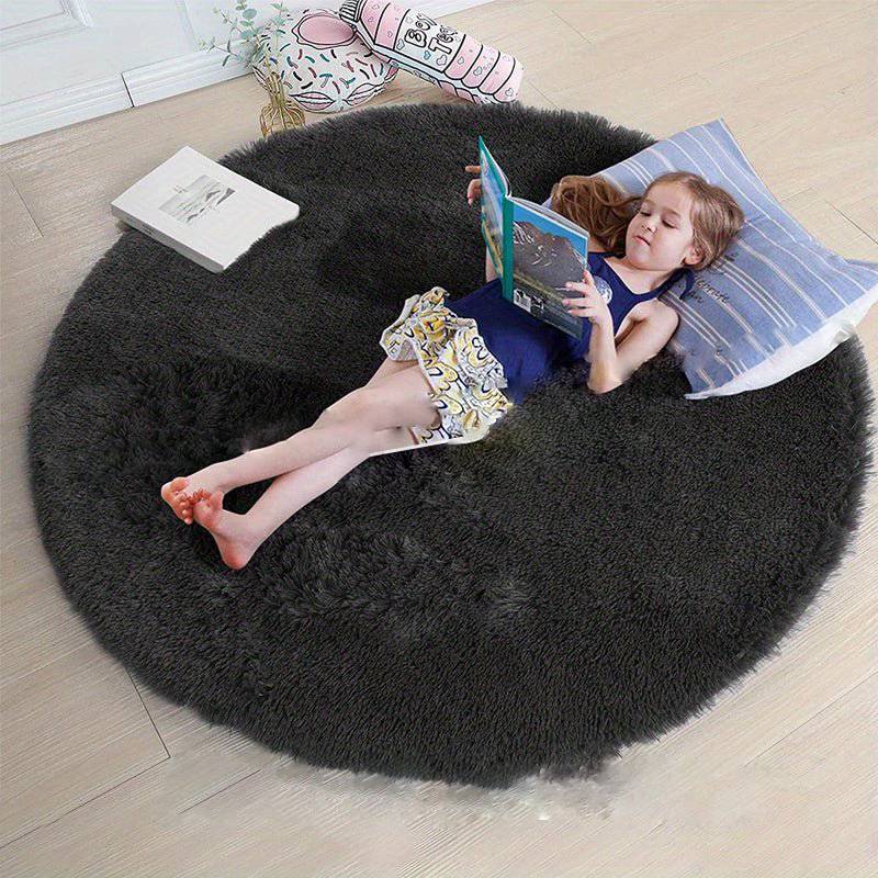 Modern rond fluffy tapijt Clouda, brengt warmte en gezellige sfeer in elke ruimte.