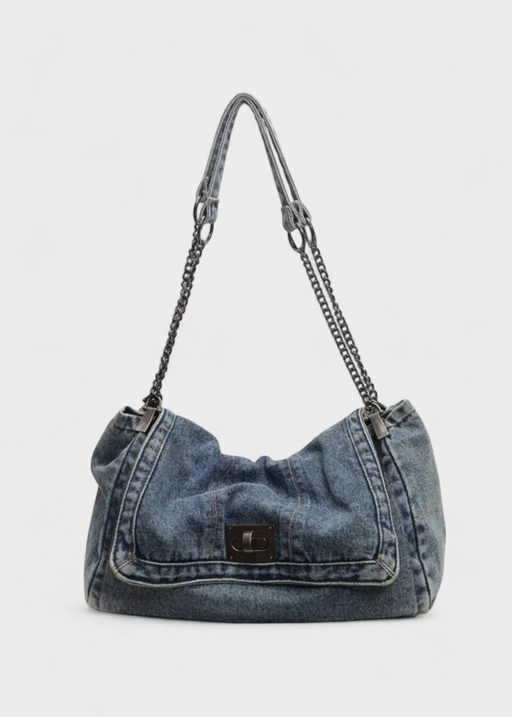 Lichtblauwe denim kettingtas voor dames, trendy urban stijl schoudertas met draaisluiting.
